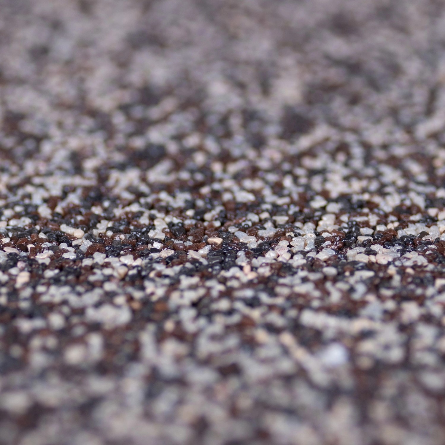 Terralith Buntsteinputz Mosaikputz, beige-braun, 1mm Körnung.