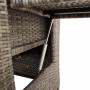 Grauer Poly Rattan Gartensessel: Klappbarer Beistelltisch mit Gasfeder-Mechanismus an der Armlehne.
