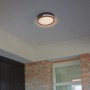 Moderne Lutec LED-Außenwandleuchte Rola in Anthrazit, runde Form. Warmweißes Licht für den Außenbereich.