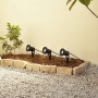 Lindby Thorgal 3er Set: Schwarze Außenleuchten/Gartenleuchten mit Erdspieß im Beet.