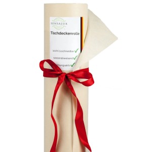 Cremefarbene Sensalux Vlies-Tischdeckenrolle (1,5 m x 25 m) mit roter Schleife.