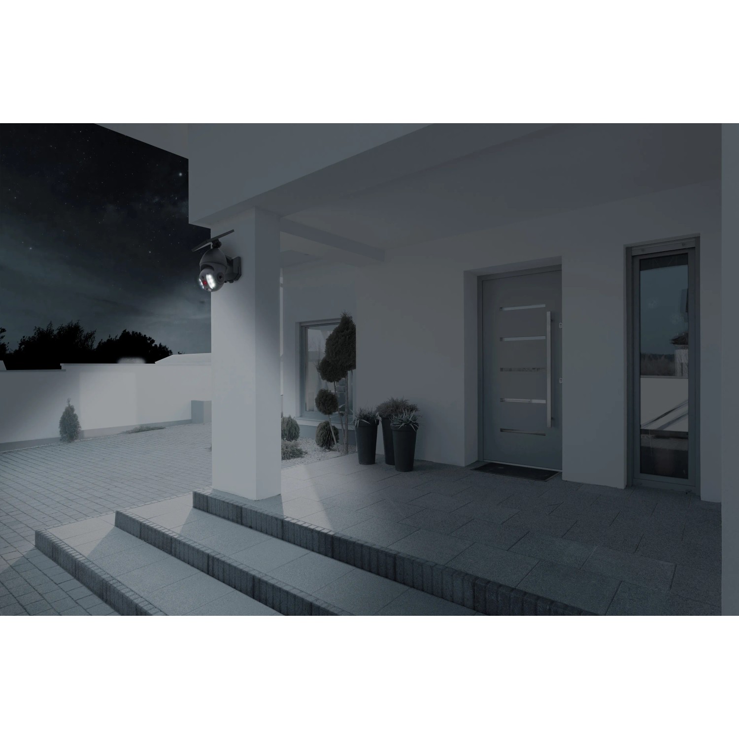 Näve LED Solar-Wandleuchte Moho mit Bewegungsmelder und Kamera-Attrappe an Hauswand.