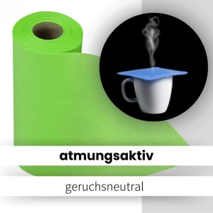 Apfelgrüner Sensalux Vlies-Tischläufer (30 cm x 25 m) auf Rolle, mit Tasse im Hintergrund.
