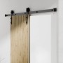 Radex Schiebetür-Komplettset Akustikpaneel Lamette mit Lamellen und schwarzer Schiene.