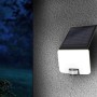 MegaLight Solar-LED-Strahler Sunflood, 1500 lm, mit Bewegungsmelder an grauer Wand.