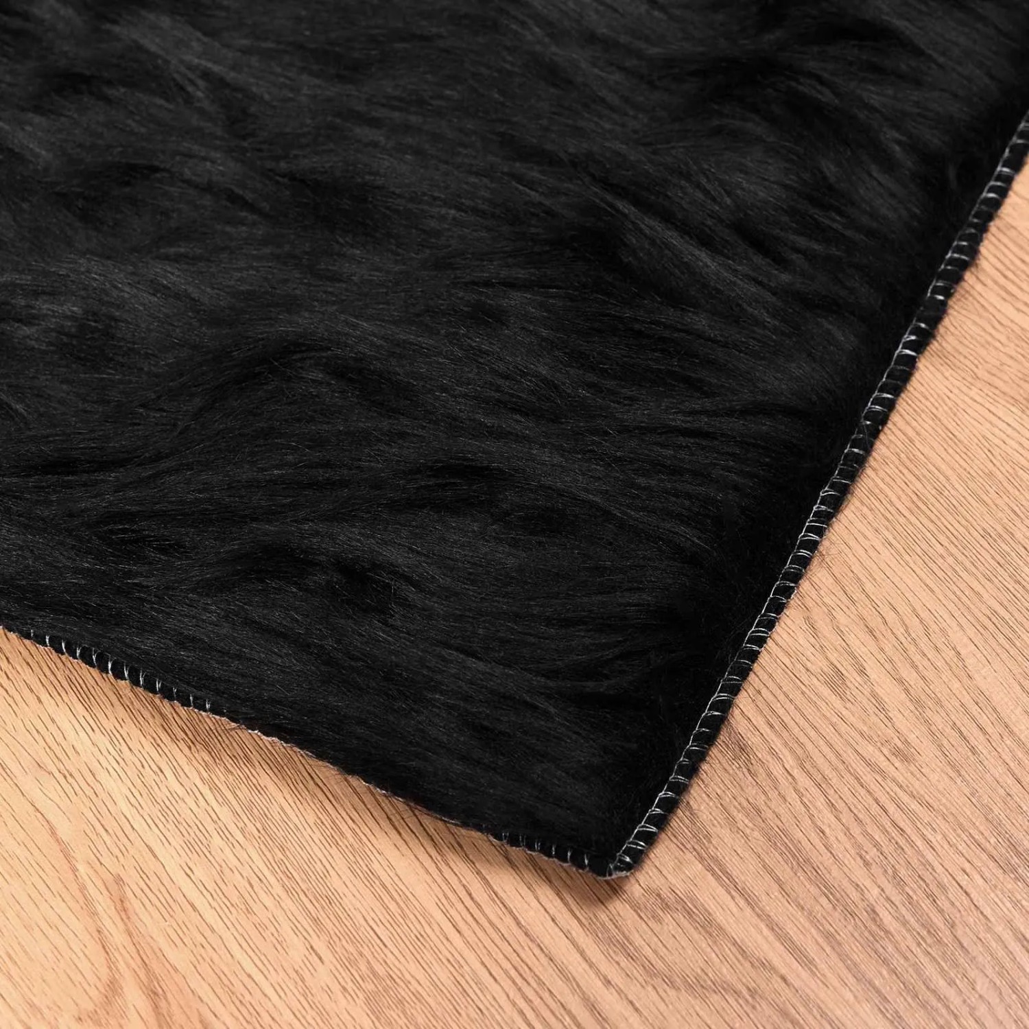Schwarzer vidaXL Kunstschaffell Teppich (80x250cm) aus Polyester. Flauschiger Teppich für Wohnzimmer.