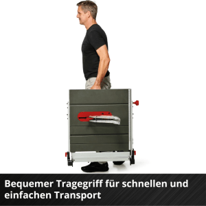 Mann trägt Einhell Tischkreissäge TP-CC 10 T am Tragegriff für einfachen Transport.