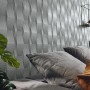 Graue Erismann Vliestapete mit grafischem 3D-Muster aus der Guido Maria Kretschmer Kollektion.