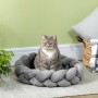 Graues PawHut Katzenbett Donut mit Katze. Waschbares, geflochtenes Kissen, Ø55 cm.