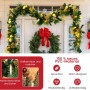Weihnachtsgirlande mit goldenen Kugeln und warmweißen LEDs als festliche Weihnachtsdekoration.