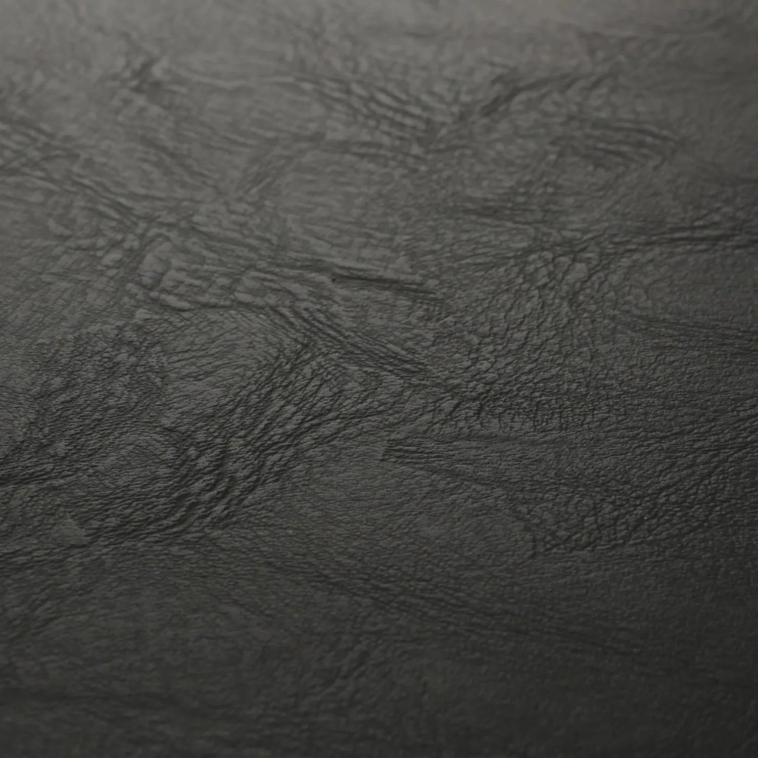 Detailaufnahme: Schwarzes Kunstleder der MCW Barhocker N22 Sitzfläche.