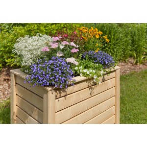 Kiehn-Holz Hochbeet aus Fichte (100x60x75cm) bepflanzt mit bunten Blumen.