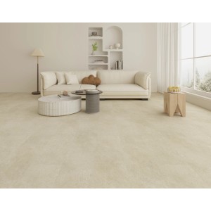 Verlegter Click-Vinylboden Pisa in Steinoptik im Wohnraum mit Couch und Tisch.