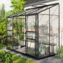 Vitavia Gewächshaus Ida 3300, schwarzes Anlehngewächshaus mit Glas und Aluminiumrahmen im Garten.