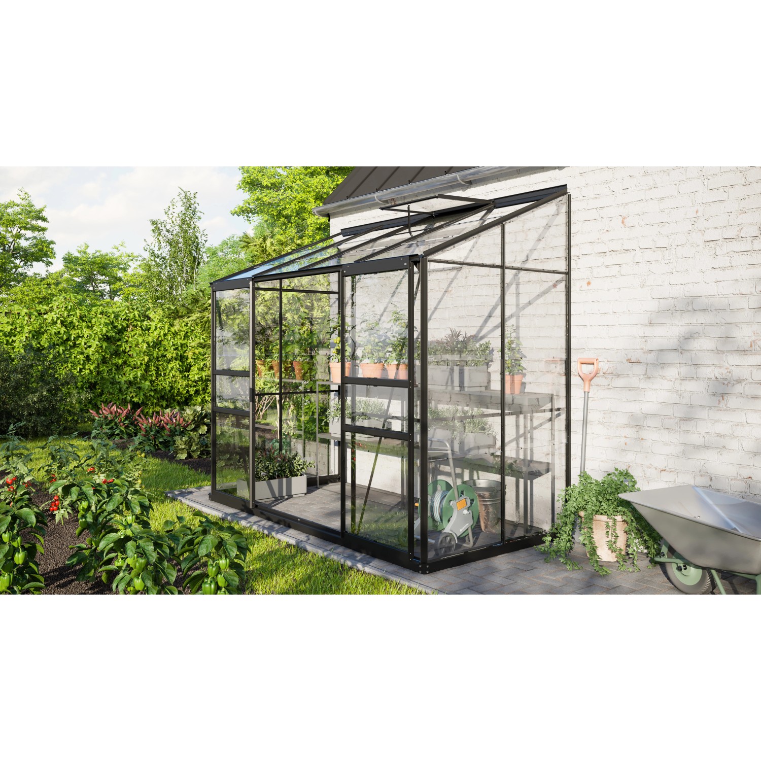 Vitavia Gewächshaus Ida 3300, schwarzes Anlehngewächshaus mit Glas und Aluminiumrahmen im Garten.