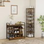 HOMCOM Schuhregal aus Spanplatte und Metall in Braun mit Schuhen dekoriert.