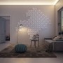Wohnraum mit grauen NOEL & MARQUET NMC IL4-Box WALLSTYL Eckleisten als indirekte Beleuchtung.
