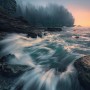 Vlies Fototapete Cry of the Sea: Küstenlandschaft mit Gischt und Wald im Nebel, 200x280 cm.
