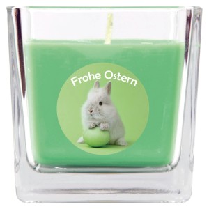 Grüne HS Candle Duftkerze im Glas mit Osterhase und Ei, Brenndauer 50h.