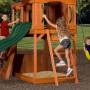 Backyard Discovery Spielturm Atlantic mit Rutsche, Schaukel und Kletterwand. Kinder beim Spielen.