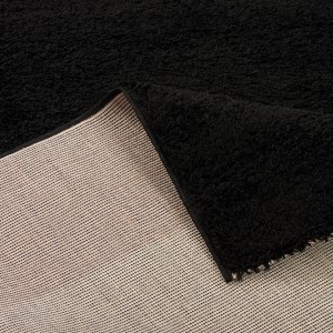 Schwarzer Langflor Teppich Aloha (140x200cm) von Pergamon, Detailansicht der Rückseite.