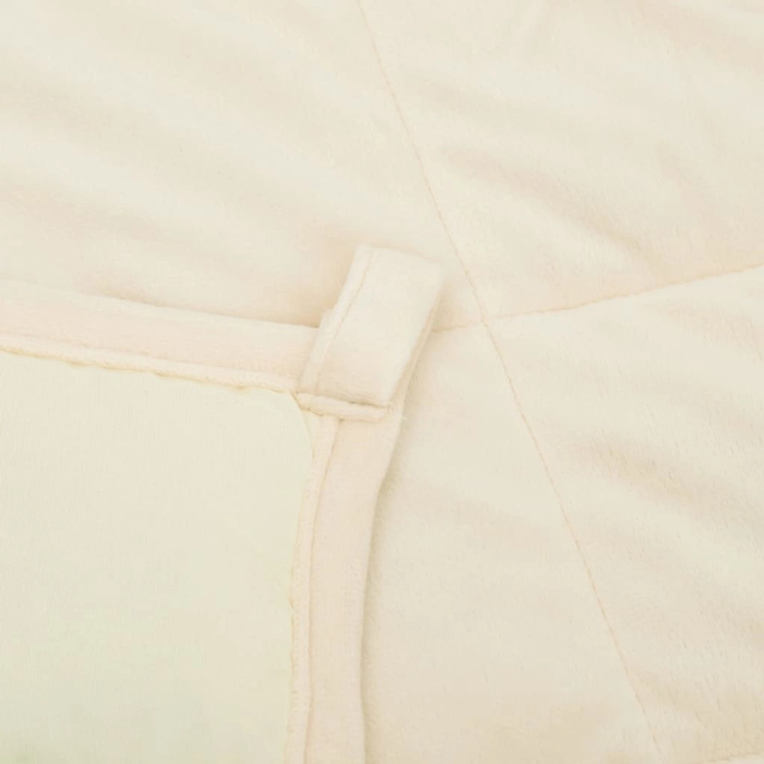 Nahaufnahme: Hellcremefarbene vidaXL Gewichtsdecke (9 kg) aus Stoff mit Schlaufen.