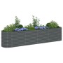 Graues furnicato Garten-Hochbeet aus verzinktem Stahl, bepflanzt mit Blumen und Pflanzen.