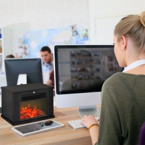 Kompakter HOMCOM Elektrokamin in Schwarz mit LED-Flammeneffekt auf einem Büroschreibtisch. Elektrischer Kaminofen.