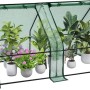 Grünes WOLTU Foliengewächshaus mit Metallrahmen und Fenstern, gefüllt mit verschiedenen Topfpflanzen. Ideal für Garten & Balkon.