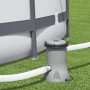 Bestway Flowclear Filterpumpe (2.006 l/h) neben Pool auf Rasen mit Schläuchen.