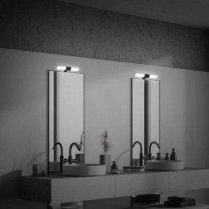 Moderne Badezimmer-Szene mit zwei Brilo LED-Spiegelleuchten Klak Schwarz über Waschbecken.