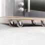 Rechteckiges Transportbrett TE-200 mit weichen Rollen unter einem Gerät. Tragkraft 200 kg.