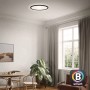 Schwarze, smarte Brilo WiFi LED Deckenleuchte Slim mit App- und Sprachsteuerung im Wohnraum.