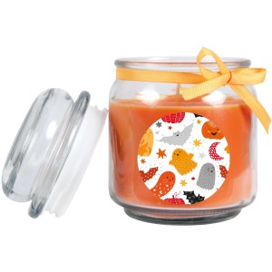 Orangefarbene Duftkerze im Glas mit Halloween-Motiv und Schleife. Stumpenkerze für stimmungsvolle Beleuchtung.