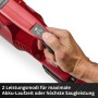 Hand wählt Eco-Modus am roten Einhell Akku-Stielstaubsauger. Zwei Leistungsmodi für Akku-Laufzeit oder maximale Saugkraft.