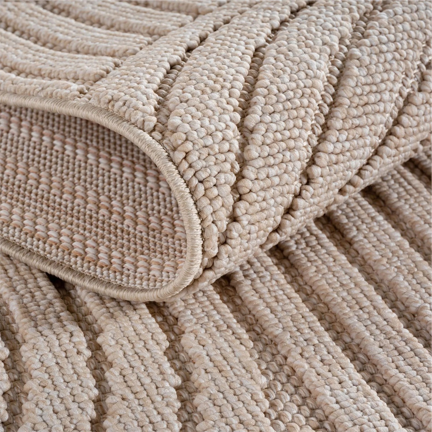 Detailansicht des beigen Ayyildiz Flachgewebeteppich Helix mit Schlingenstruktur.
