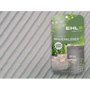 EHL Dünnbett-Mauerkleber 20 kg, Steingrau. Für Mauersteine und Gartenmauern. Robuster Sack auf grauer Fläche.