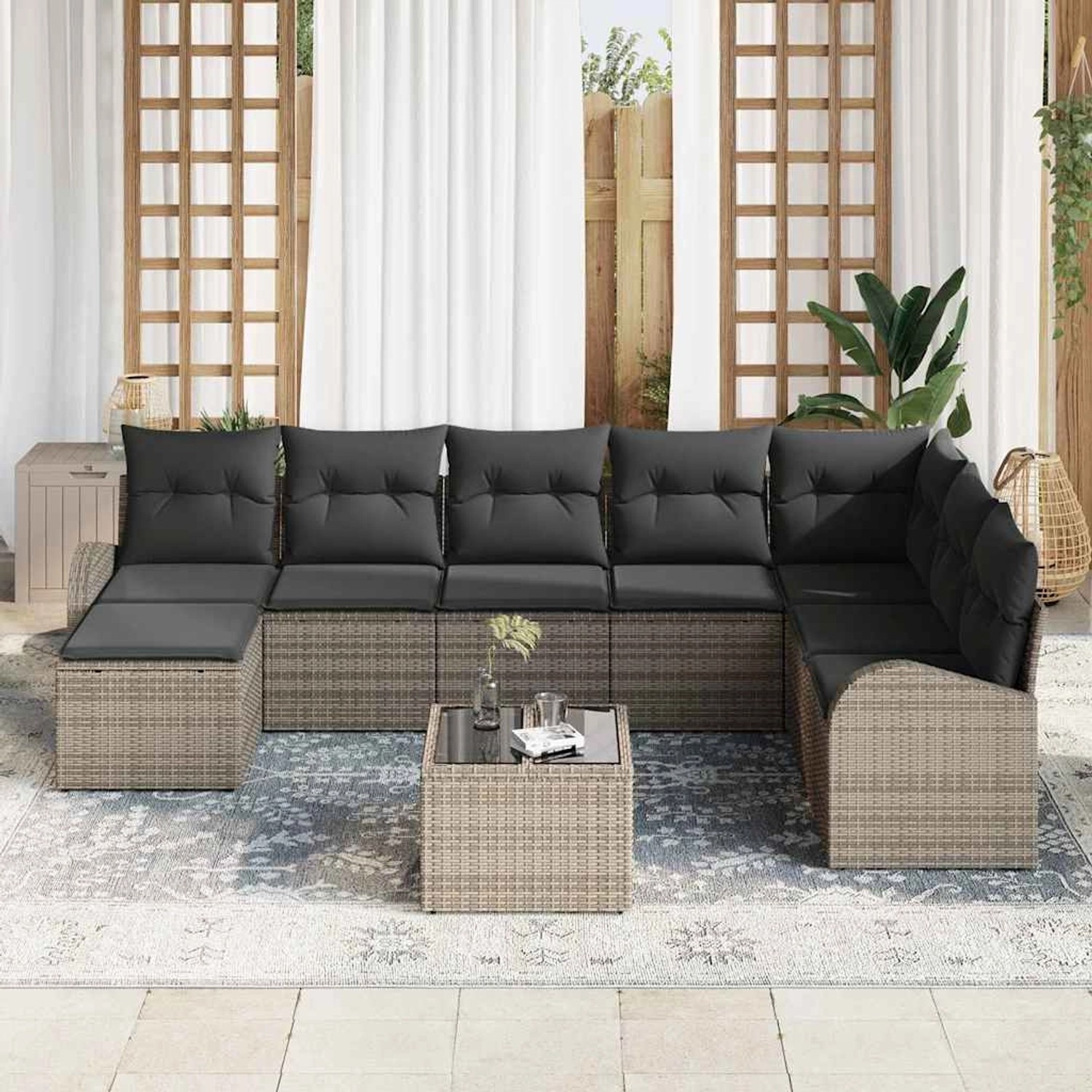 Graues 9-teiliges vidaXL Garten-Sofa-Set aus Poly Rattan mit Kissen und Tisch.