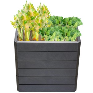 Gefülltes, graues Garantia Hochbeet Ergo Quadro M 75 Stone aus Kunststoff mit Salat und Gemüse.