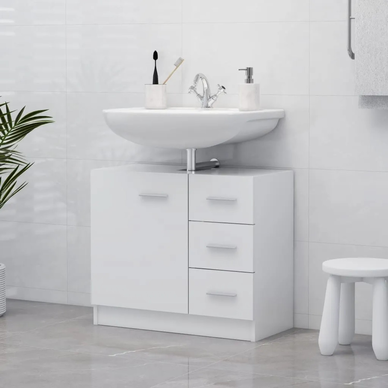 Weißer Waschbeckenunterschrank mit Schubladen und Waschbecken für Badmöbel-Set.
