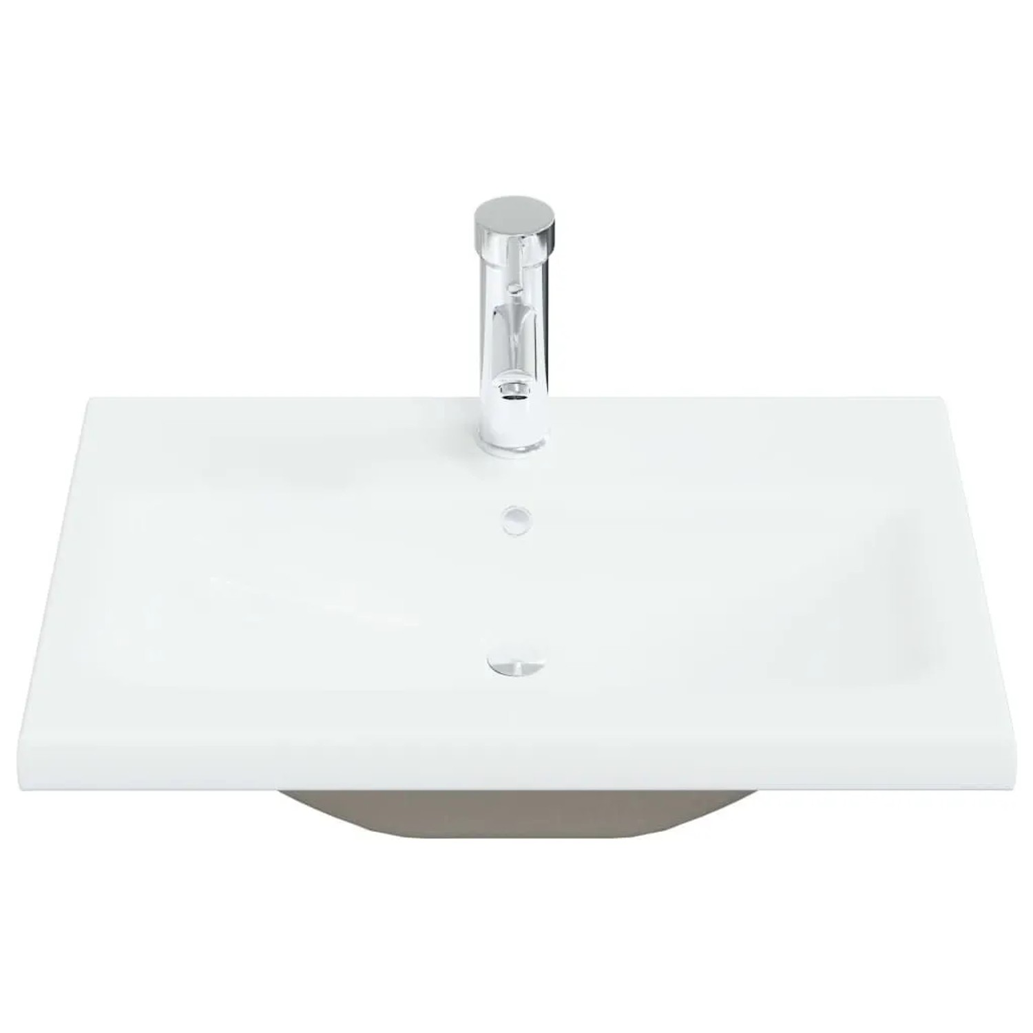 Weißes Keramik Einbauwaschbecken mit glänzendem Wasserhahn. Modernes Design für Bad und Gäste-WC.