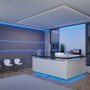 Paulmann MaxLED RGBW LED-Streifen in modernem Büro. Blaue Lichtakzente an Wand und Empfangstheke, weißer Deckenstreifen.