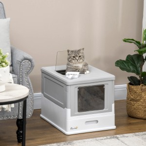 Grau-weißes PawHut Katzenklo mit Katze darin. Geschlossene Katzentoilette mit Schaufel.