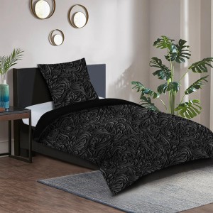 SANILO Bettwäsche 2-teilig Floral, schwarzes florales Muster auf Bett und Kissen.