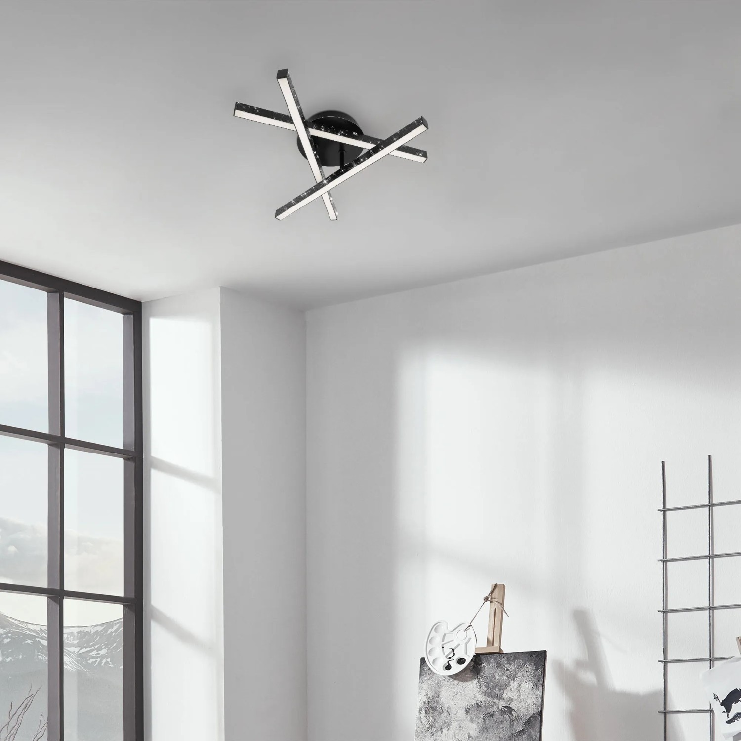Moderne, schwarze Brilo LED-Deckenleuchte Rey, 3-flammig mit Glitzereffekt im Wohnraum.