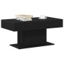 vidaXL Couchtisch Schwarze Eiche aus Holzwerkstoff, 96x50x45 cm. Rechteckig, mit Büchern und Tasse.
