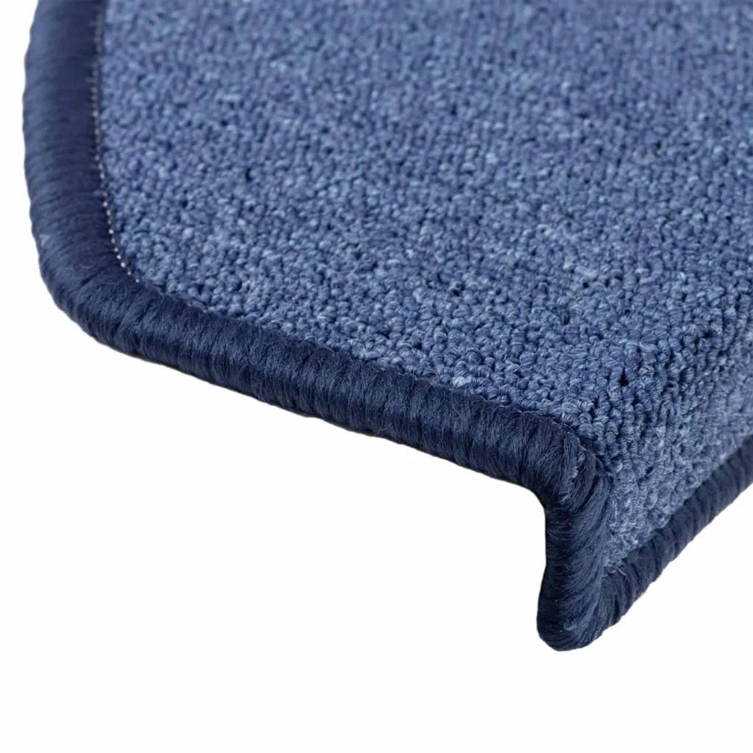 Detailaufnahme: Blaue VidaXL Treppenmatte, 65x24 cm, mit rutschfester Oberfläche und Kantenschutz.