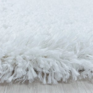 Detailaufnahme: Weißer Ayyildiz Hochflorteppich Fluffy, weicher Flor.