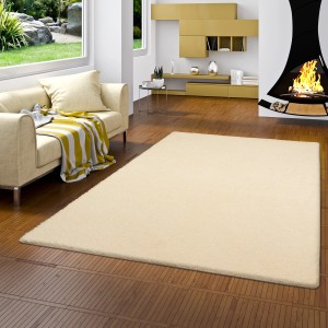 Cremefarbener Snapstyle Hochflor Shaggy Teppich Palace, 100x300cm, im Wohnzimmer.