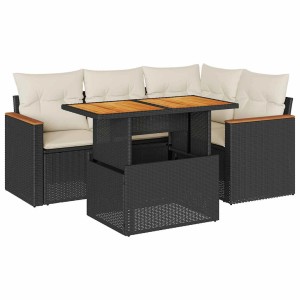 Schwarze 5-tlg. Garten Sofagarnitur aus Polyrattan mit Akazienholz-Tisch und cremefarbenen Kissen.